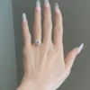 3 Carat Brilliant Round engagement ring with six-prong petal setting