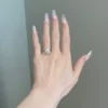Engagement ring with premium CZ diamond and pave basket detail