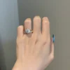 3mm wide ring with brilliant round stones in a modern bezel setting