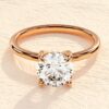 Round cut 2 carat diamond engagement ring with classic styling