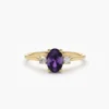 Classic gemstone-style ring with a striking amethyst centre stone
