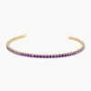 Sterling silver tennis bracelet with amethyst-coloured stones and bright CZ detailing