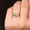 Baguette emerald signet ring with a clean, structured face