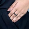 Distinctive ring design with striking black stone