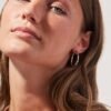 Bold sterling silver hoop earrings with chunky silhouette