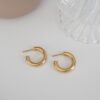 Chunky tube hoop earrings with a clean, modern shape