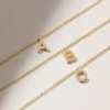 Gold-plated letter bracelet with personalised charm design