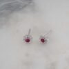 Dainty flower earrings featuring a push-back closure