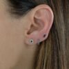 Gold-plated sterling silver flower studs with sparkling stones