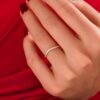 Delicate curved ring designed for stacking with solitaire rings