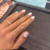 Gold-plated spiral ring with bezel-set diamond-like sparkle