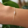 Bracelet combining thick gold plating with clustered CZ stones