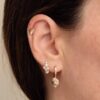 Gold-plated sterling silver conch shell stud with premium CZ stones