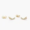 Minimal curved bar stud earrings with a refined modern shape