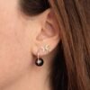 Stud earring featuring premium CZ diamonds in a clustered daisy butterfly design
