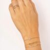 Script-style Mom ring with smooth band and bright stone accents