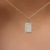 Personalised tag necklace featuring an initial and diamond-look finish