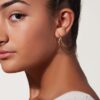 Double hoop earrings with a polished gold-plated finish