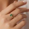 925 silver ring with emerald-cut and round stones