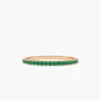 Emerald stone eternity band with polished finish