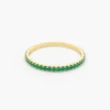 Sterling silver eternity ring with vivid green stones