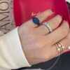 Gemstone signet ring with clean flat profile and sparkling accents