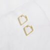 Modern angular hoop earrings with a polished silver base