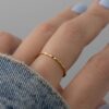 Gold-plated sterling silver ring with a hammered finish