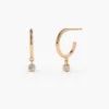 Hoop earrings with refined shine and dangling motion