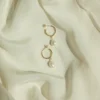 925 Silver Margot Pearl Hoops featuring pearl details and cubic zirconia sparkle