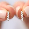 925 Silver stud earrings featuring marquise and round CZ stones