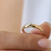 Gold-plated engagement ring with elongated marquise silhouette