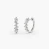 Small huggie earrings with polished gold finish