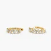 Huggie earrings featuring baguette-style premium CZ stones