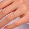 Minimal sterling silver wedding ring with subtle pave sparkle
