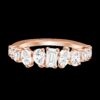 Diamond band featuring round, pear, marquise and emerald cuts