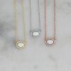 Gold-plated sterling silver opal halo necklace with lobster clasp
