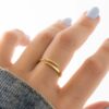 Open spiral ring with an adjustable design and dainty profile