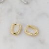 Dainty oval huggies earrings with a slender 2mm profile