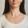Minimal necklace with spaced pavé-set beads along a chain