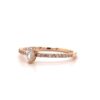Pave solitaire pear ring with a clean, slim silhouette