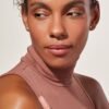 Elegant stud earrings featuring pearl accents and polished metal