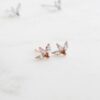 Petal stud earrings measuring 9mm by 6.5mm
