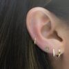 Minimal huggies earrings sold as a pair for everyday styling