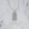 Gold-plated sterling silver necklace with raised rose design