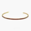 Red garnet tennis bracelet featuring pave-set premium CZ stones