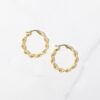 Modern hoop earrings with a clean ribbon-like silhouette