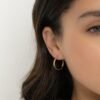 Modern hoop earrings with a sleek flat profile and nickel-free silver