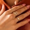 Elegant pinky ring featuring a slim profile and bright sparkle