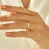 Delicate silver ring designed for the pinky finger